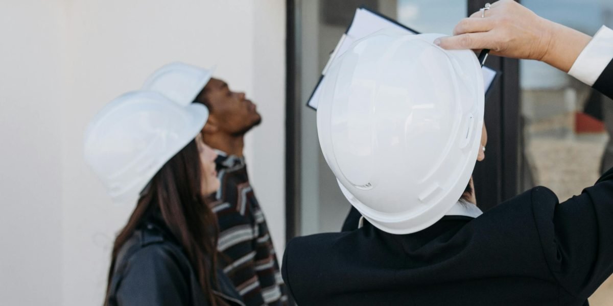 An individual thoughtfully assessing various property listings, symbolizing the initial phase of a real estate search.